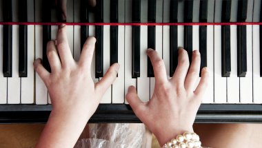 Hands on piano keys clipart