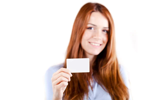 Portrait of an atractive young business woman presenting a business card — Stock Photo, Image