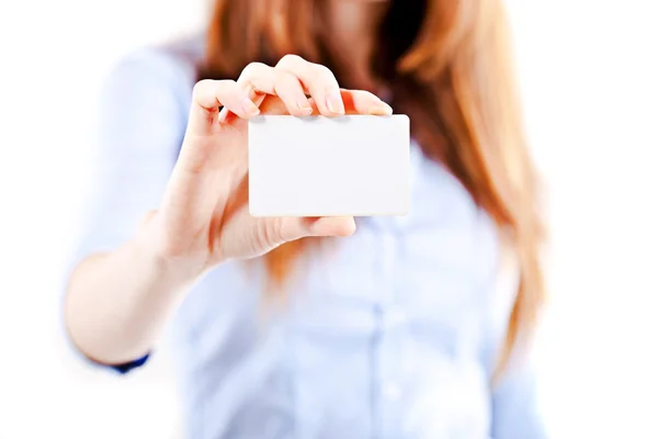 stock image Portrait of an atractive young business woman presenting a business card