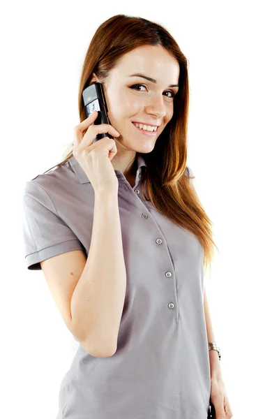 Aantrekkelijke jonge vrouw met behulp van een mobiele telefoon — Stockfoto