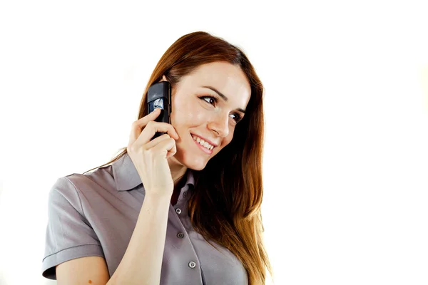 Attractive young woman using a mobile phone — Stock Photo, Image