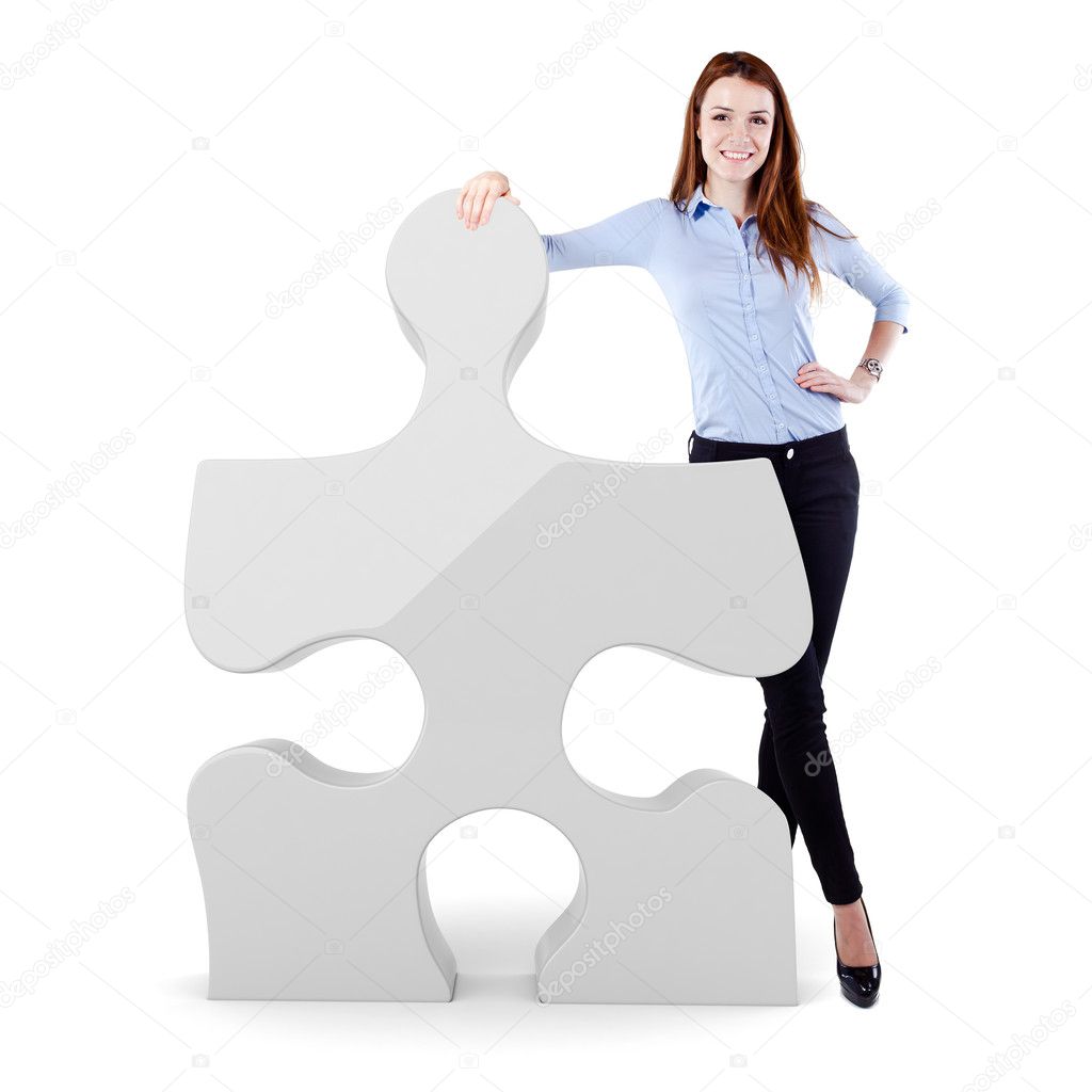 Attractive business woman and a puzzle piece