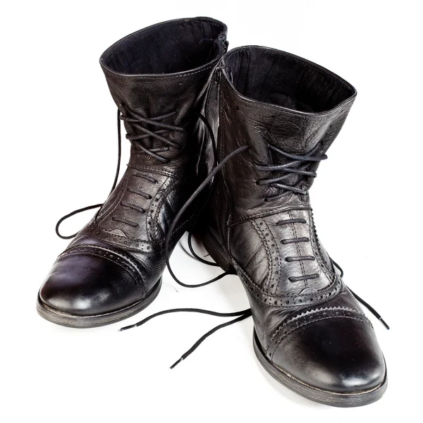 stock image Black leather boots on ahite background