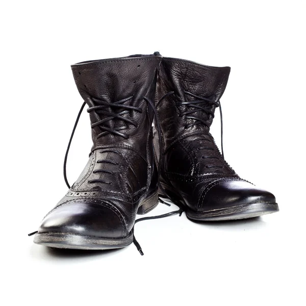stock image Black leather boots on ahite background