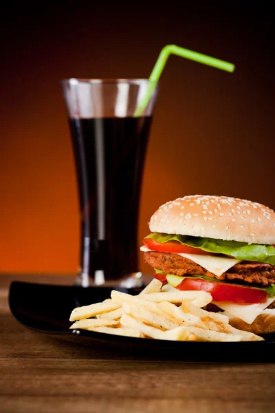 stock image Fast food tasty hamburger with franch fries and soda