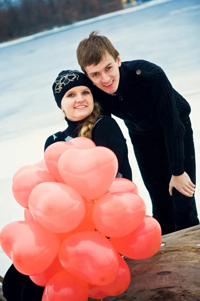 Couple in love with balls — Stock Photo, Image