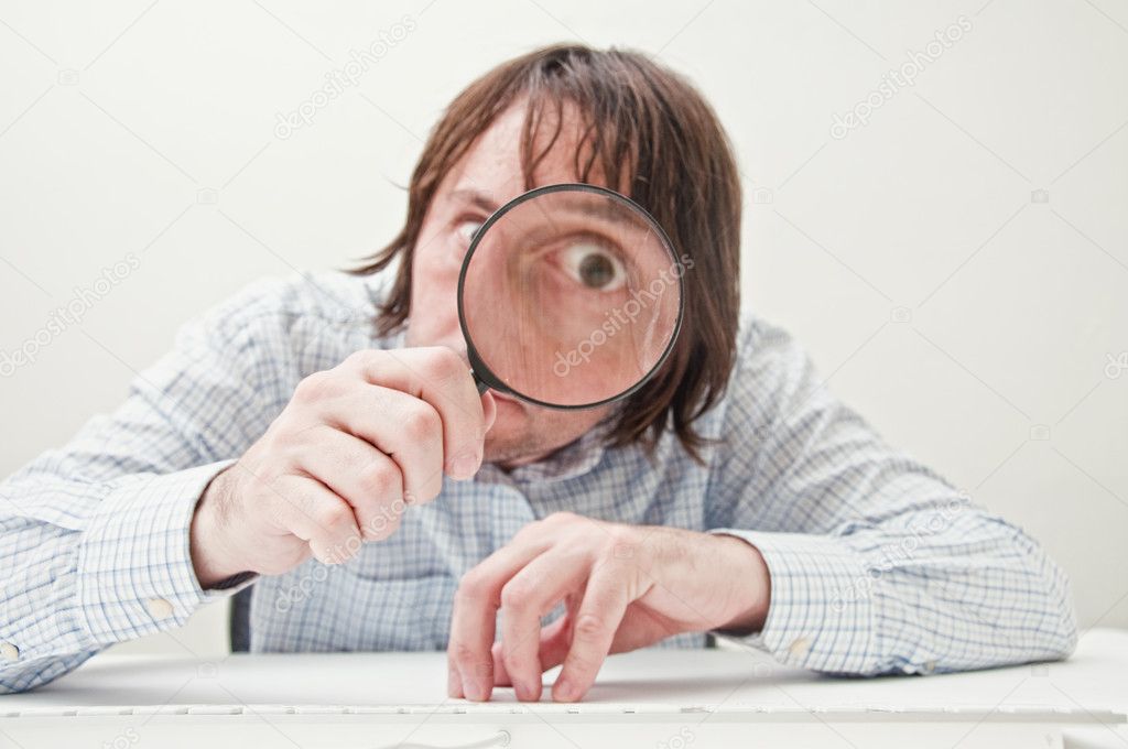 Businessman with magnifying glass