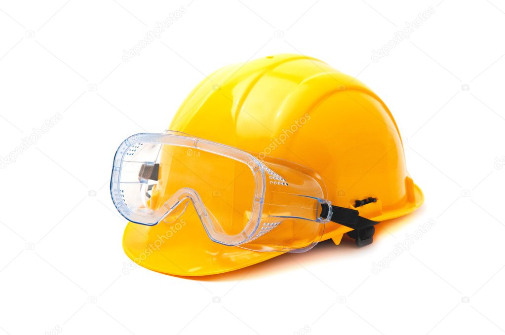 Yellow hard hat and protective goggles