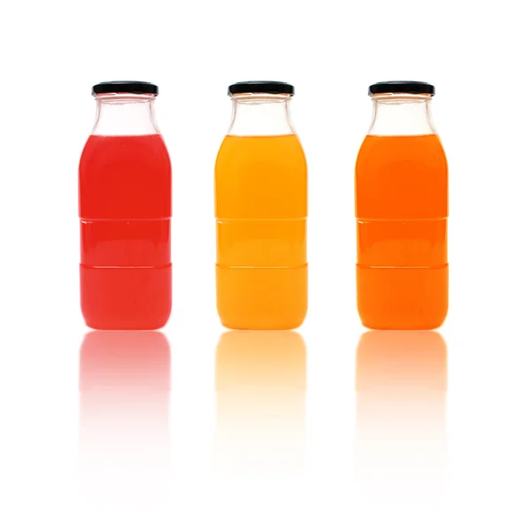 Glass bottles of juice — Stock Photo, Image