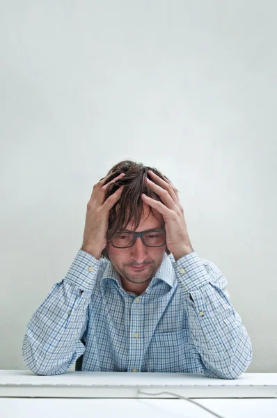 Businessman with headache — Stock Photo, Image