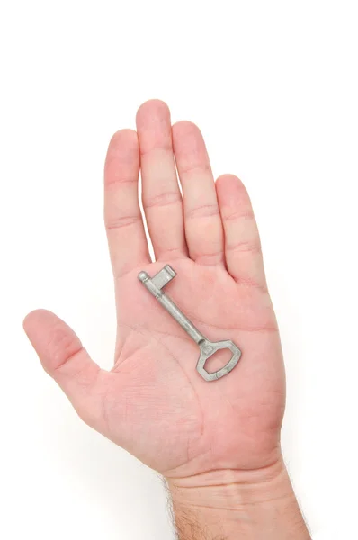 Mão com uma chave — Fotografia de Stock