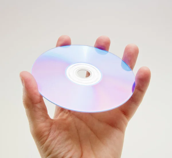 El ile bir dvd disk — Stok fotoğraf