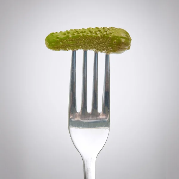 Pepino en tenedor —  Fotos de Stock