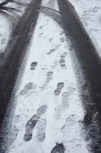 Footsteps in snow — Stock Photo, Image