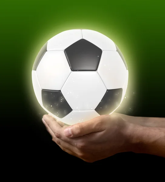 Fußballball zur Hand — Stockfoto
