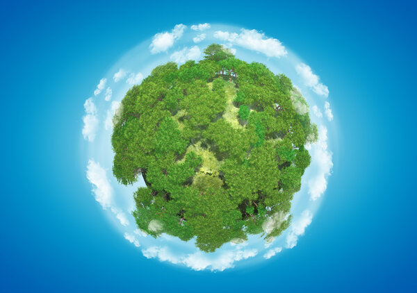 Miniature planet with sparse leafy tree vegetation and clouds on blue sky