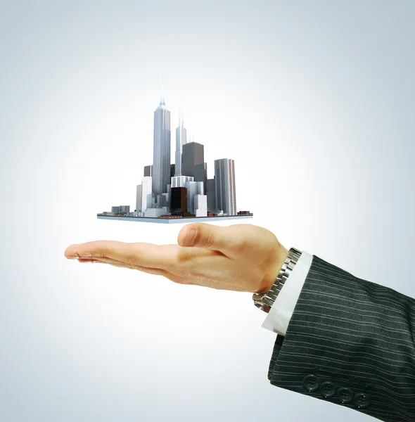 Business city center i businessman's hand — Stockfoto