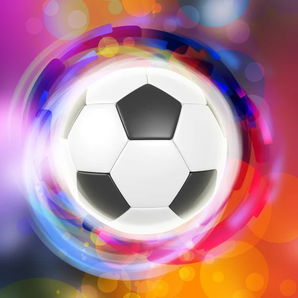 Bola de futebol no fundo anéis de cor — Fotografia de Stock