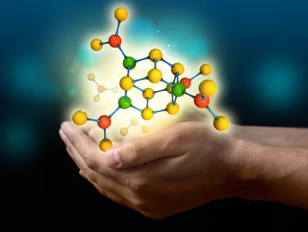 Молекулы на хенде — стоковое фото