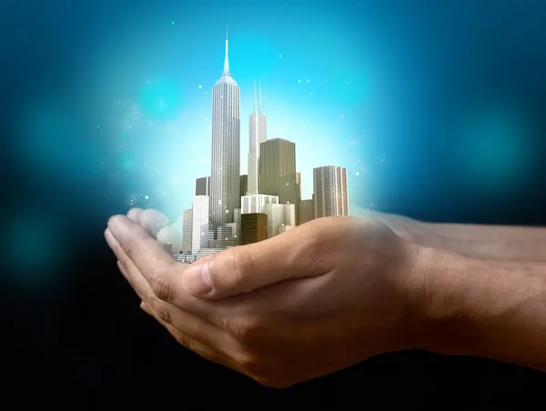 Business city center on hands — Stock Photo, Image