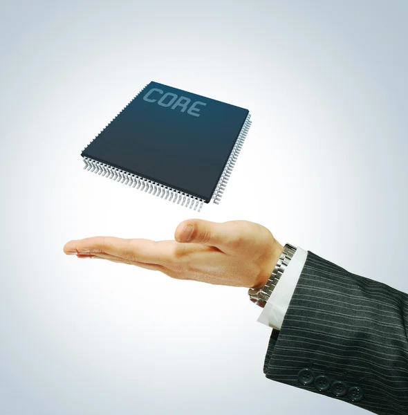Microchip em negócios hend — Fotografia de Stock