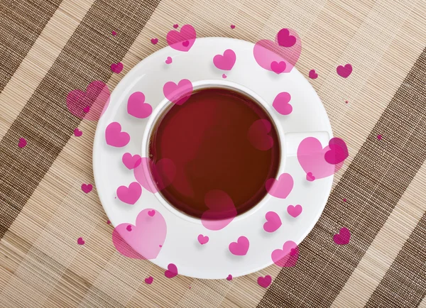 Tasse Tee mit dampfenden Herzen — Stockfoto