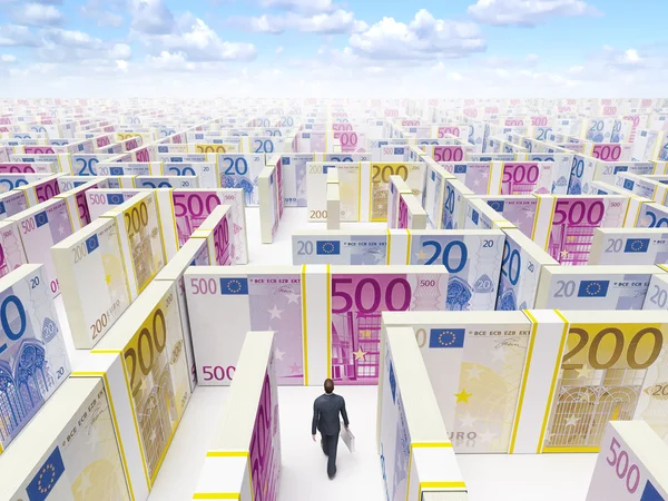 Zakenman in financiële doolhof labyrint — Stockfoto