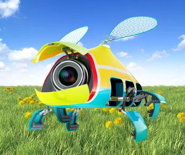 Sicurezza flay mini fotocamera su sfondo verde erba — Foto Stock