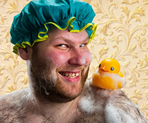 Homem feliz com brinquedo de pato — Fotografia de Stock