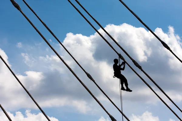 stock image Silhouette of construction climber