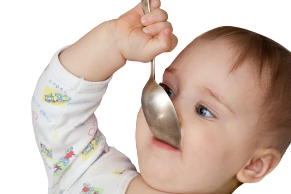 Bebé niña sosteniendo cuchara en la boca —  Fotos de Stock