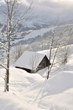 Chalet in the snow clipart