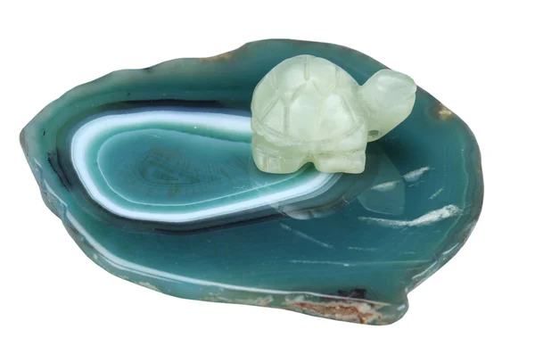 Turtle from a nephrite on a support from agate — Stock Photo, Image