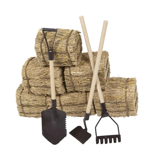 Tools Leaning on a Stack of Hay — Stock Photo, Image