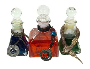 Colorful Potion Bottles With Charms clipart