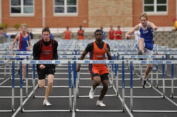 Teen Boys Competing in High School Hurdles Race — Stock Photo, Image