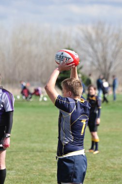 Player Preparing to Throw a Overhead Pass for a Lineout in a Women clipart