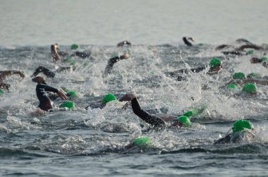 Start of a Men's Open Water Swim Race clipart