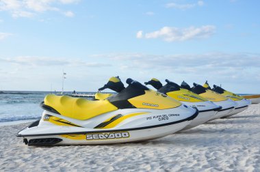 Sea-Doo Personal Water Craft (PWC) on a Tropical Beach clipart
