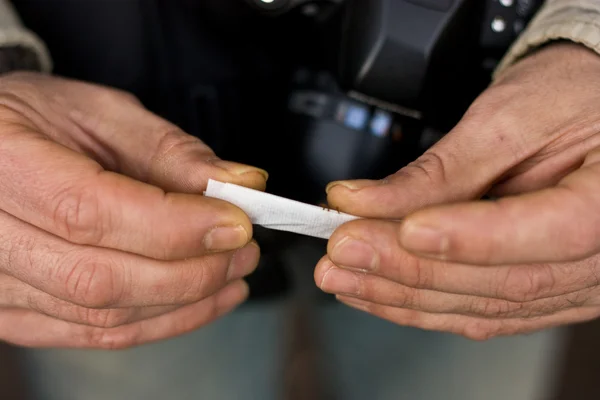 stock image Hand rolling tobacco