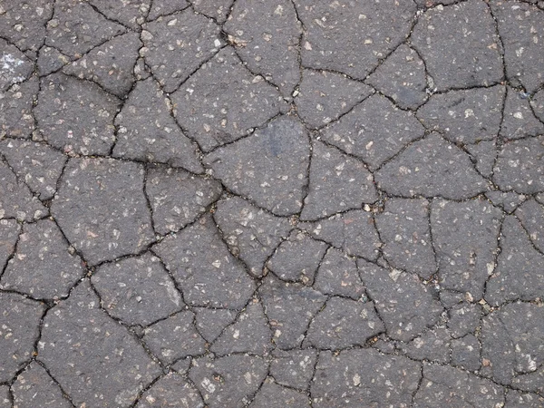 Damaged asphalt texture — Stock Photo, Image