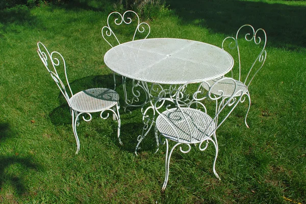 stock image Garden table and chairs in summer