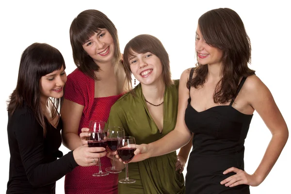 Vier junge Frauen in Abendkleidung — Stockfoto