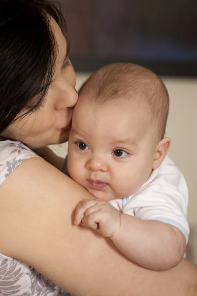 Mother holding her baby — Stock Photo, Image
