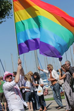 Big rainbow flag at the Gaypride 2011, Geneva, Switzerland clipart