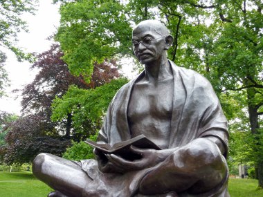 Statue of Mahatma Gandhi, Ariana park, Geneva, Switzerland clipart