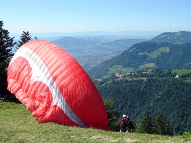 Paragliders ready to go clipart