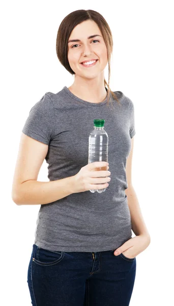 Jovem mulher bonita com uma garrafa de água — Fotografia de Stock