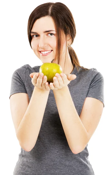 Krásná dívka drží jablko — Stock fotografie