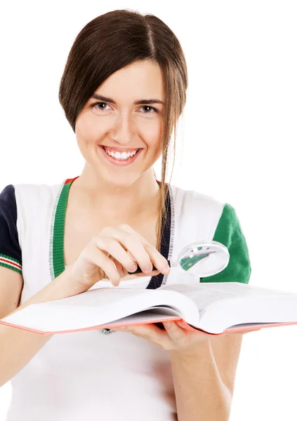 Young cute girl with a dictionary — Stock Photo, Image